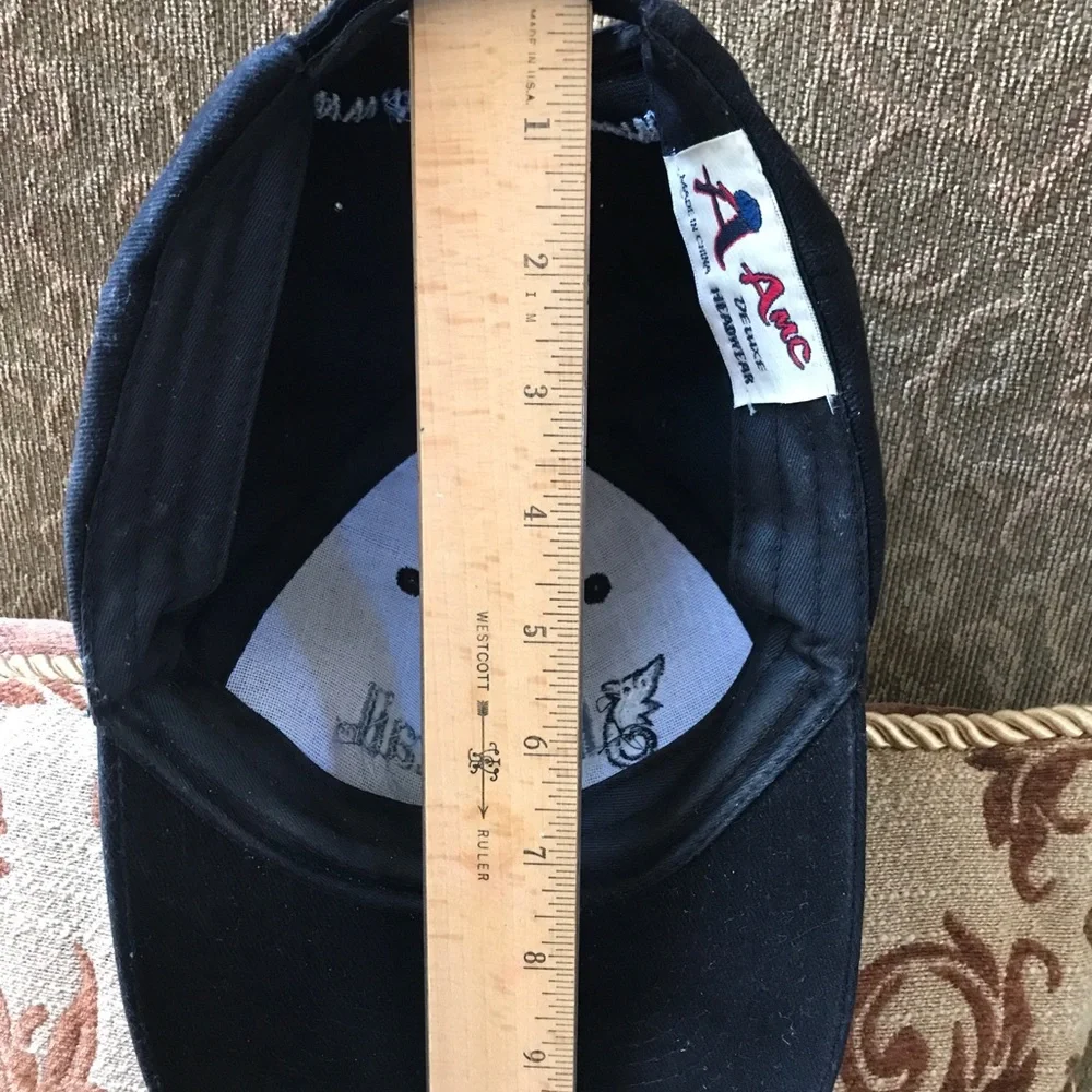 Cloth Ringtail baseball hat w/ adjustable Velcro. Great protection from the sun!